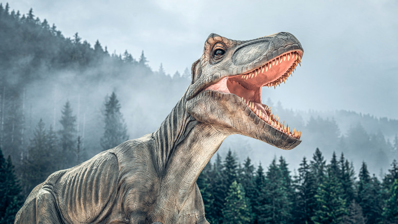 Dinosaur against a forest backdrop