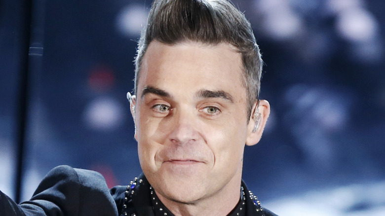 Robbie Williams performing in Italy