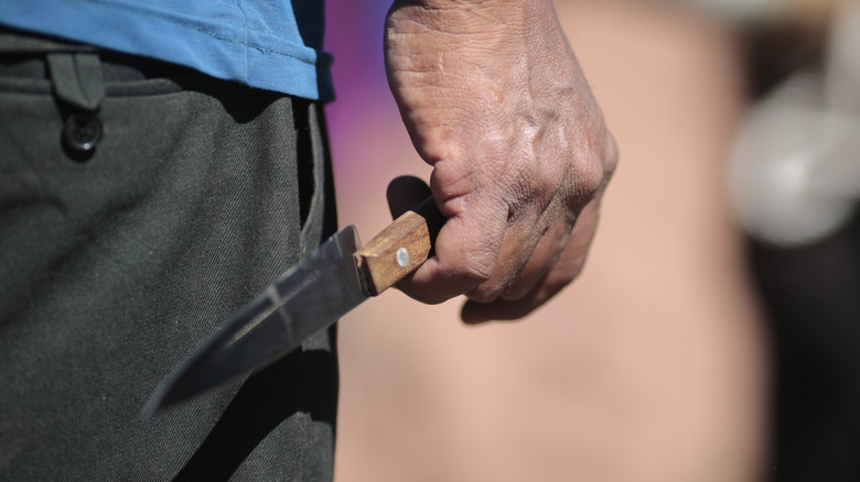 man holding knife