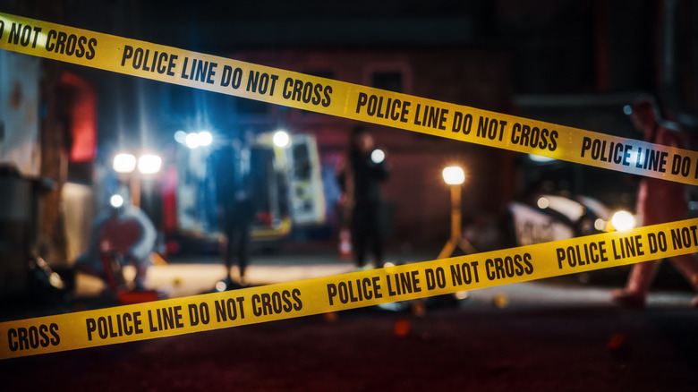 Police tape blocking crime scene