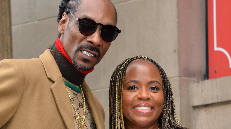 Snoop dogg and wife smile