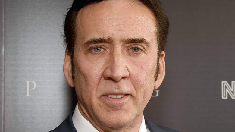 Nicholas Cage looking at camera