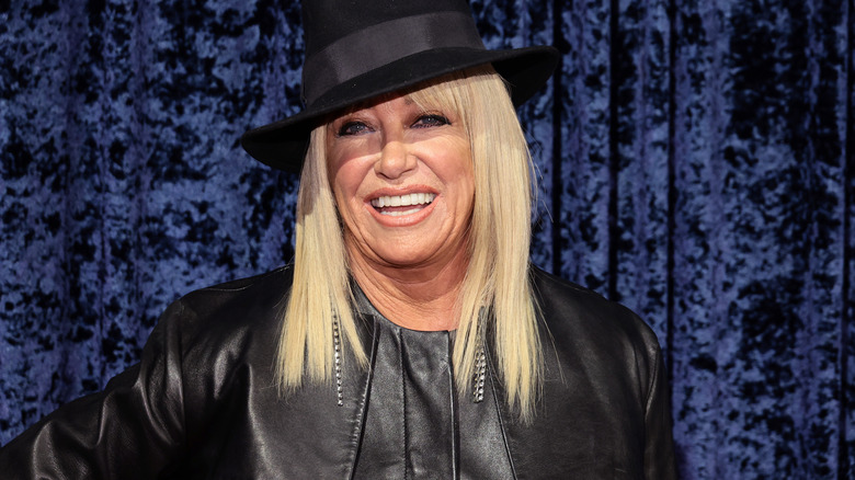 Suzanne Somers smiling black hat