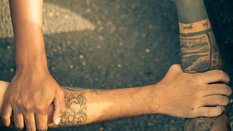 arms together in protest