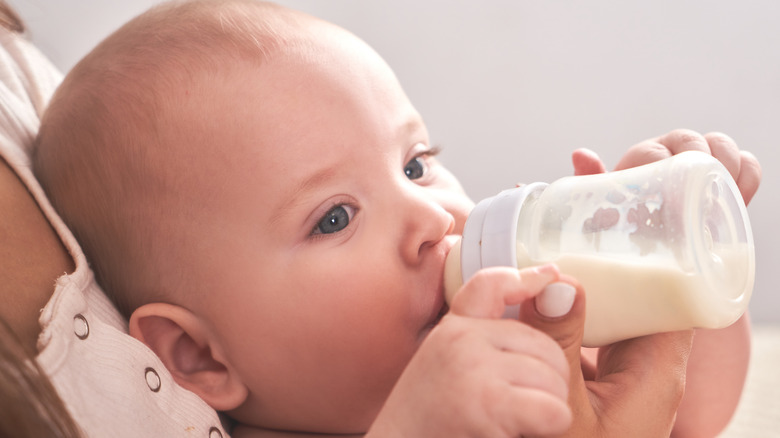 Baby drinking from bottle