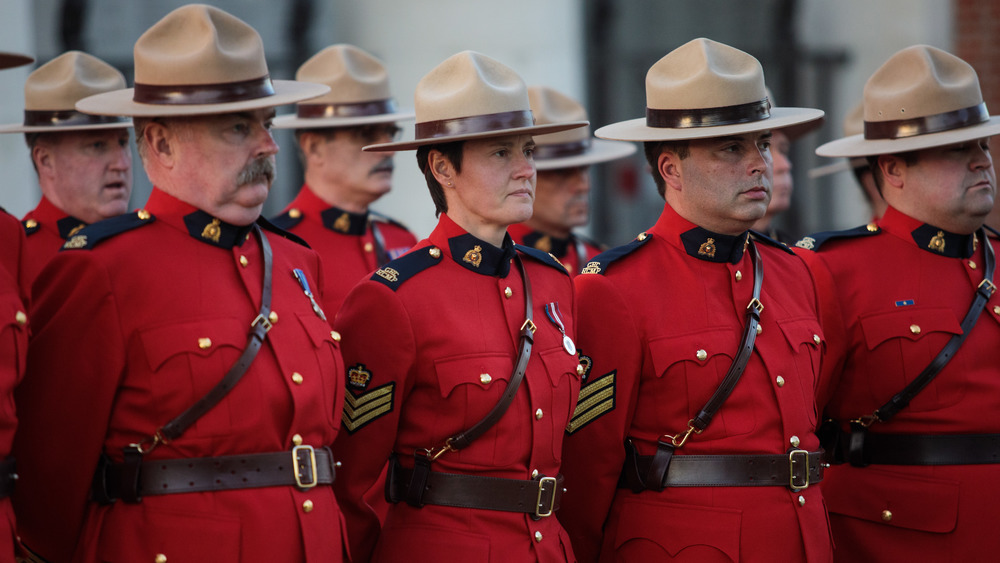 Canadian Mounties at attention