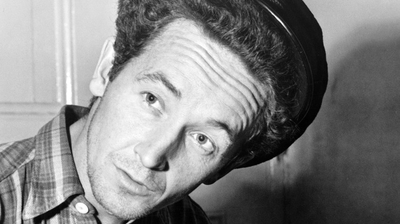 Woody Guthrie with head cocked