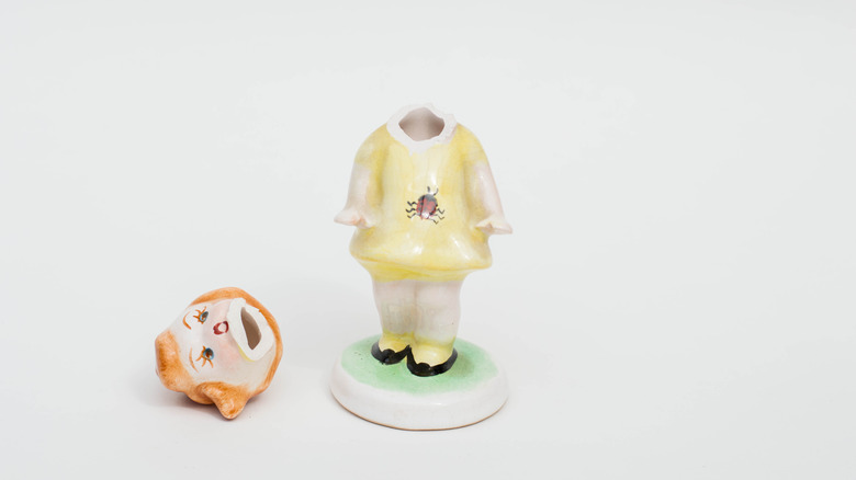 Beheaded porcelain doll