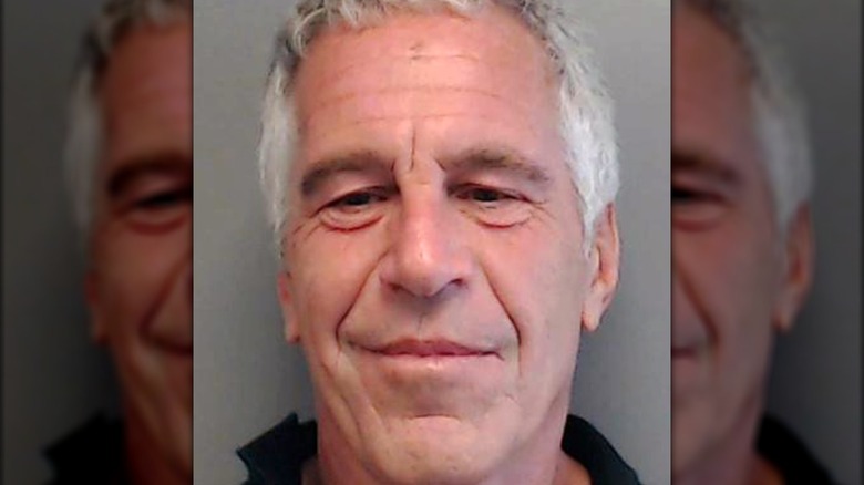 Jeffrey Epstein posing for mugshot