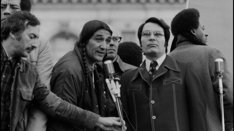 Jim Jones in glasses campaigning for Dennis Banks