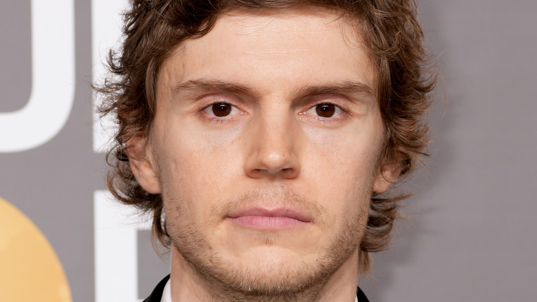 Evan Peters staring ahead