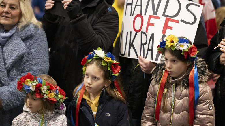 Children participating in anti-war protest in February 2022