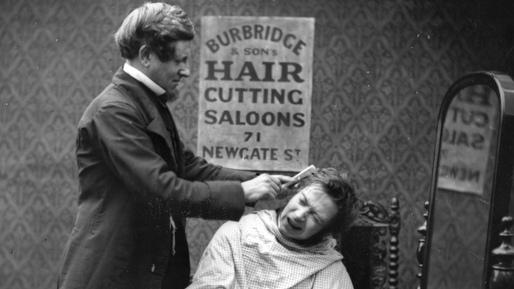 barber cutting hair