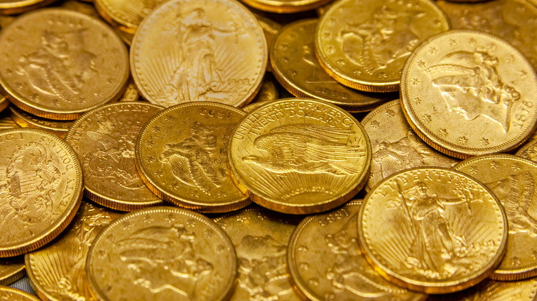 Liberty Head coins spread on table