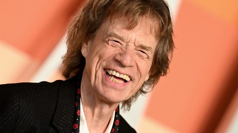Mick Jagger smiling and laughing 2025