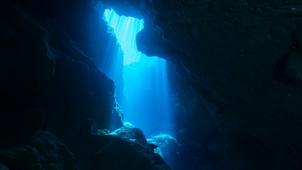 Sunbeam into an underwater cave