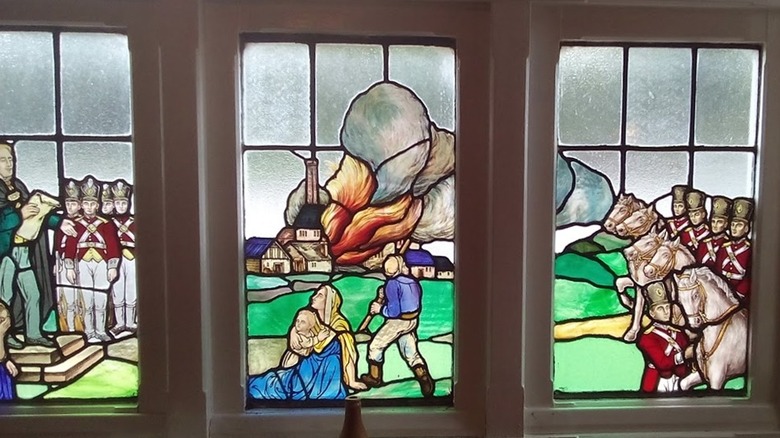 Stained glass window representing the Luddite attack on Westhoughton Mill