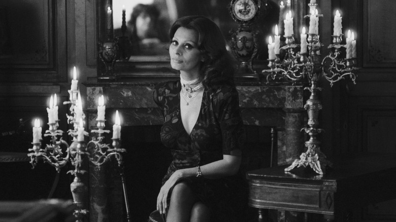 Sophia Loren next to candelabra 