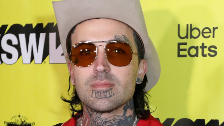 Rapper Yelawolf at event