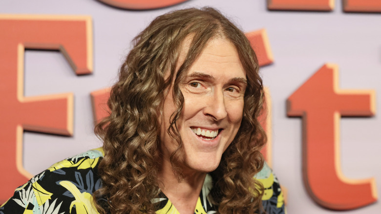 Weird Al Yankovic smiling in aloha shirt