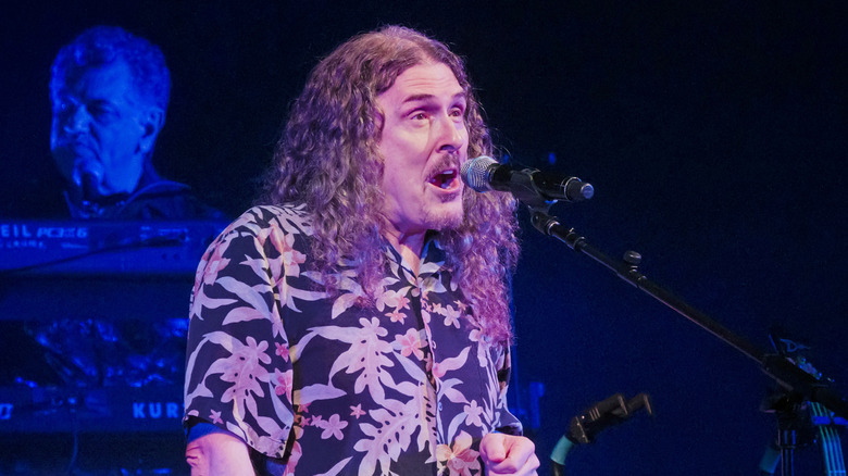 Weird Al Yankovic singing on stage