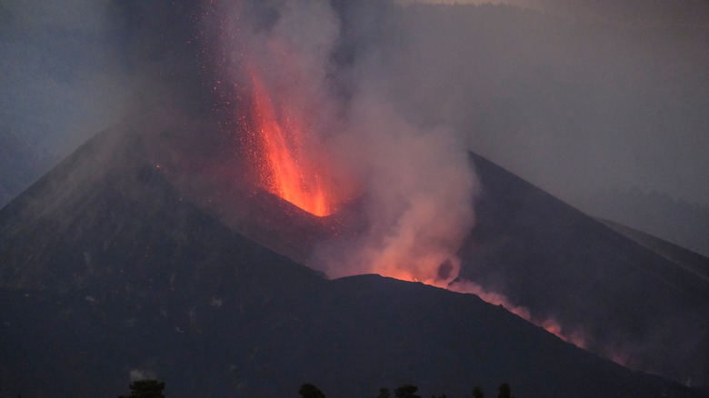 volcano erupting lava toxic cloud