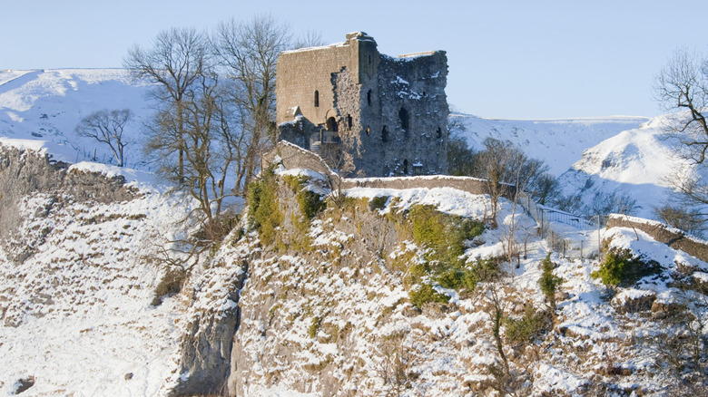 snow on ruins of castle in derbyshire