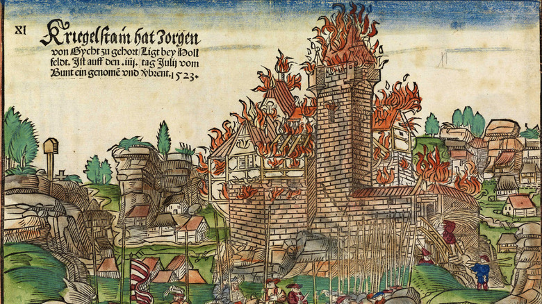 medieval illustration of a besieged castle