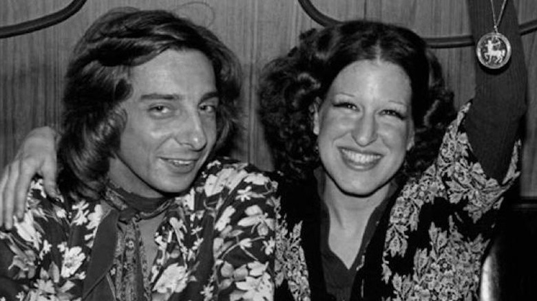 Barry Manilow posing with Bette Midler during her "Bathhouse Betty" days