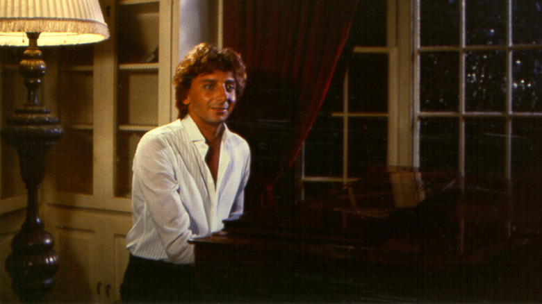 Young Barry Manilow playing the piano