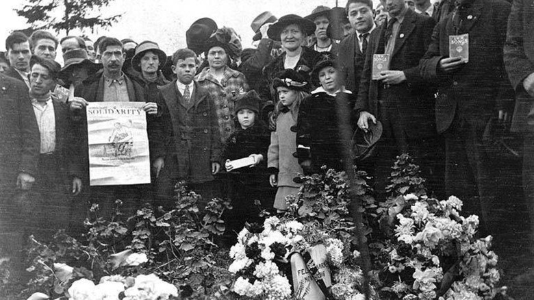 Mourners at the funeral of victim Felix Baran