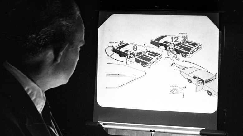 A detective projecting a chart of a police shootout at a CHP murder trial