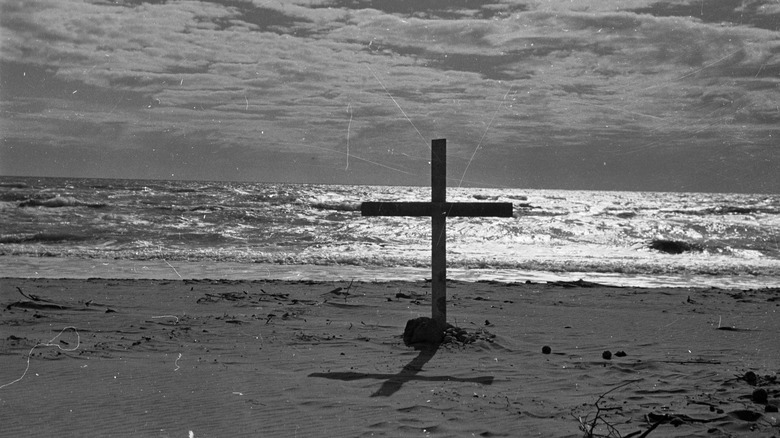 cross on beach wilma montesi memorial
