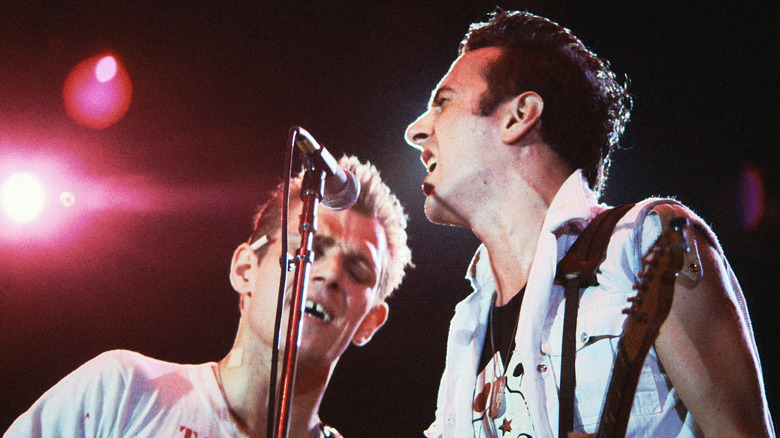 The Clash's Paul Simonon and Joe Strummer playing at the US Festival in 1983