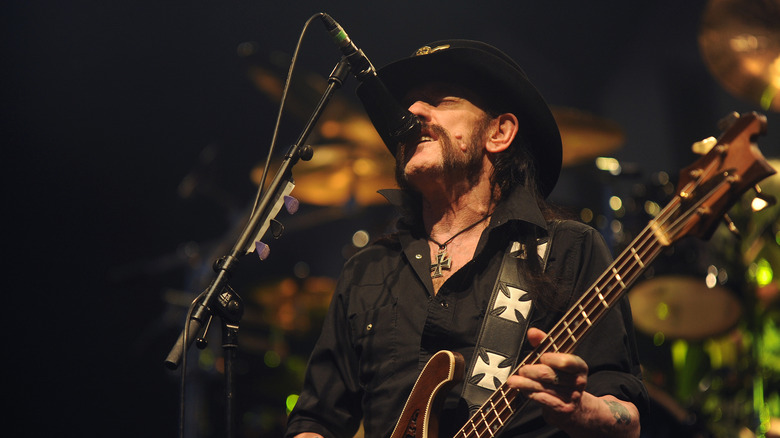 Lemmy of Motorhead onstage with mic and bass