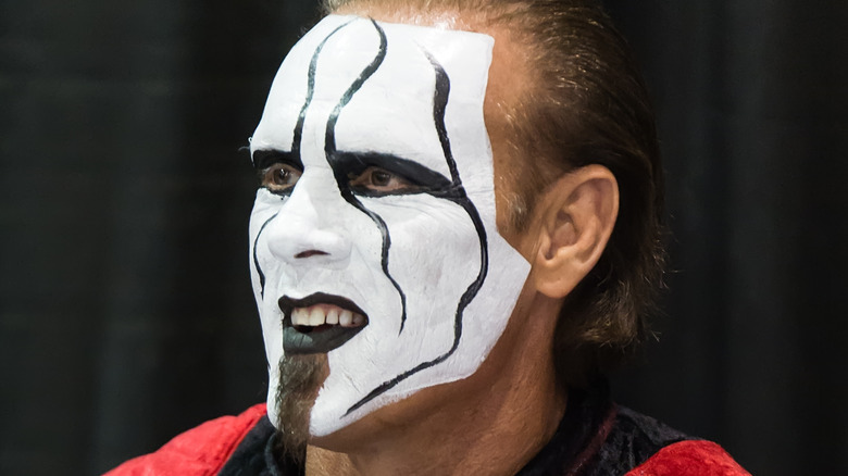 Sting white face paint looking surprised