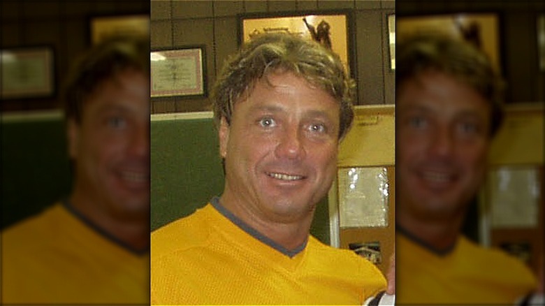 Marty Jannetty smiling in yellow jersey