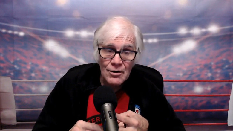 Rip Rogers speaking into microphone