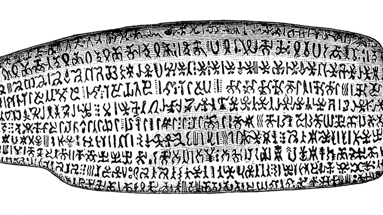 illustration of rongorongo on black and white tablet