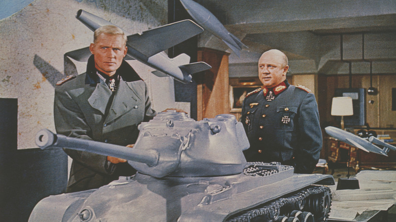 British lobby card for Ken Annakin's 1965 war film, 'Battle Of The Bulge', featuring Robert Shaw (left) and Werner Peters
