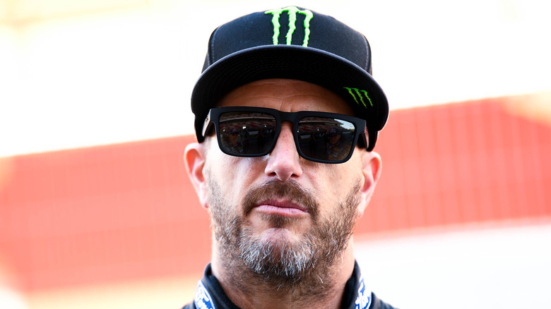 Ken Block wearing a cap and sunglasses