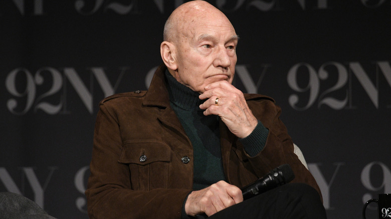 Patrick Stewart on stage looking thoughtful