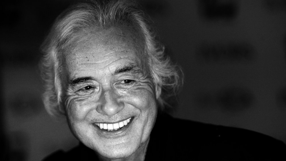 A close-up shot of Jimmy Page smiling